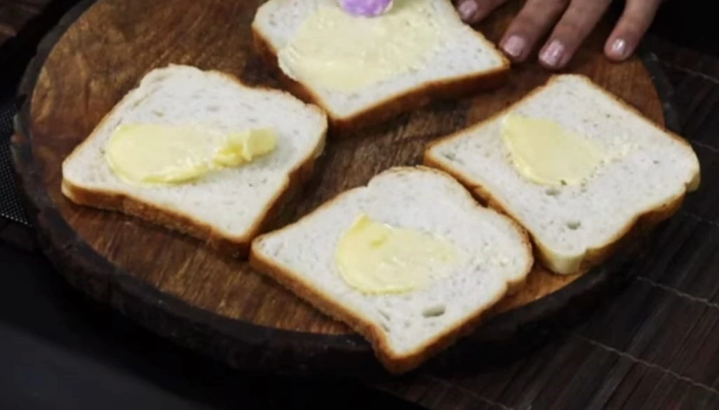 apply butter on bread slices