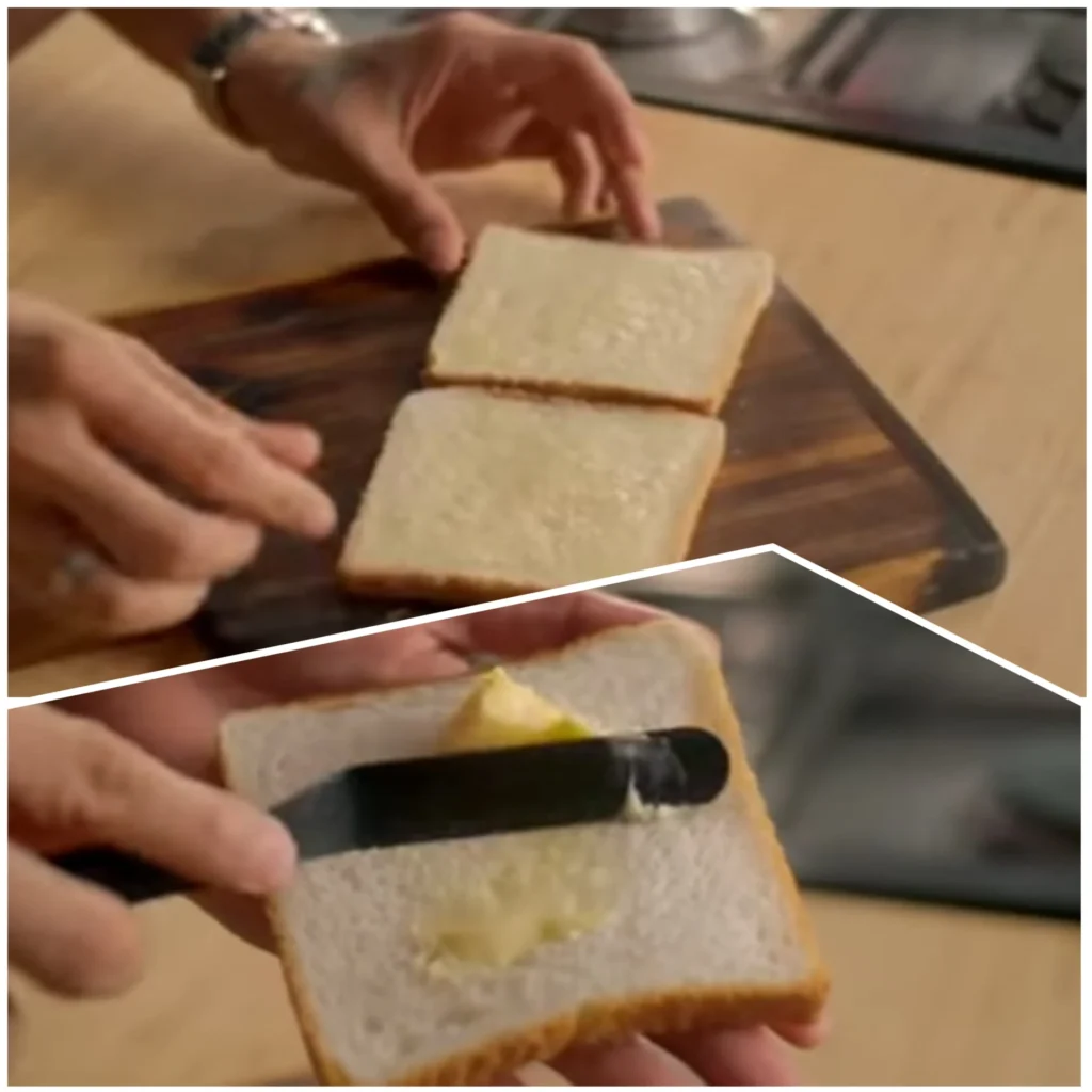 butter is applied to both bread slices