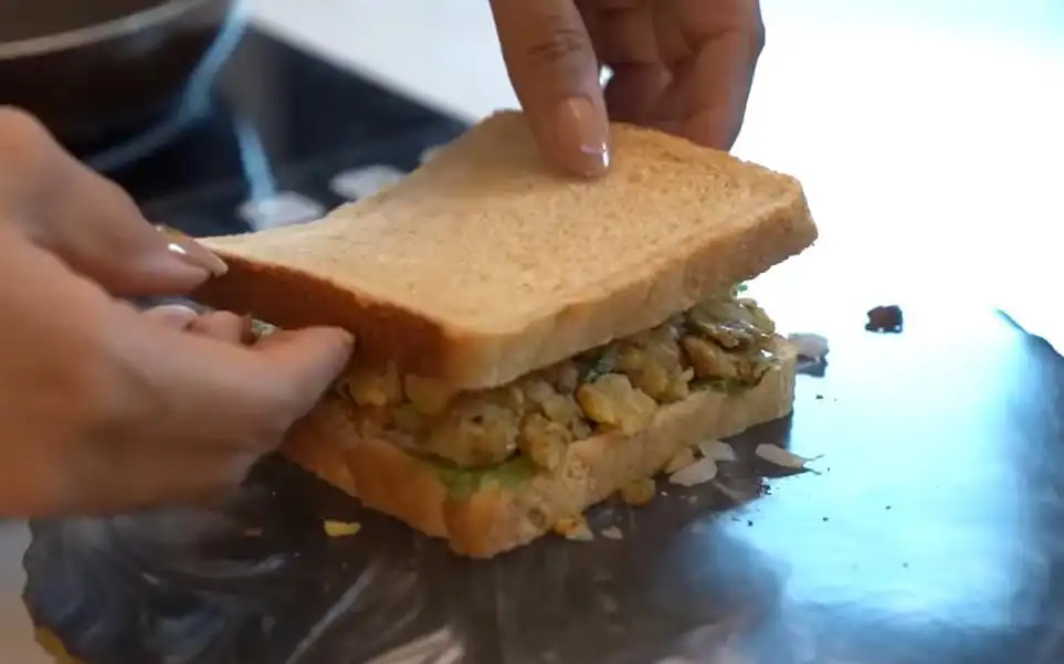 preparing chickpea sandwich