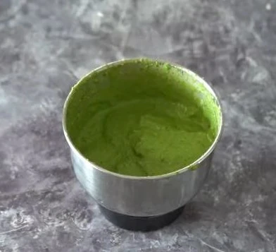 Green sauce in mixer jar