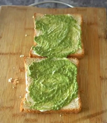 Green sauce on bread