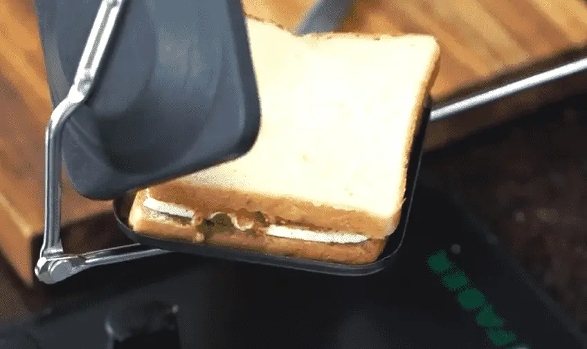 placing sandwich in toaster