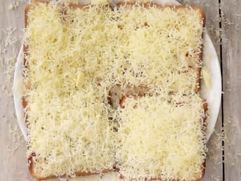 cheese grated on bread