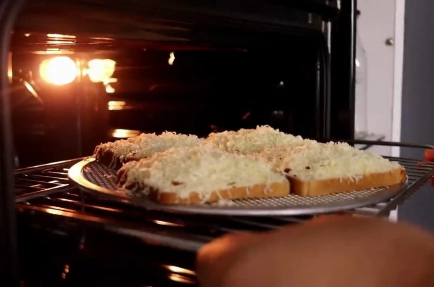 pizza tray is going in oven