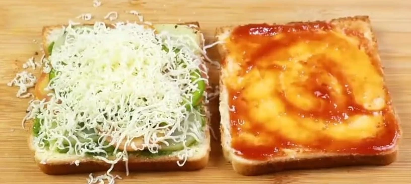 grate cheese over sandwich